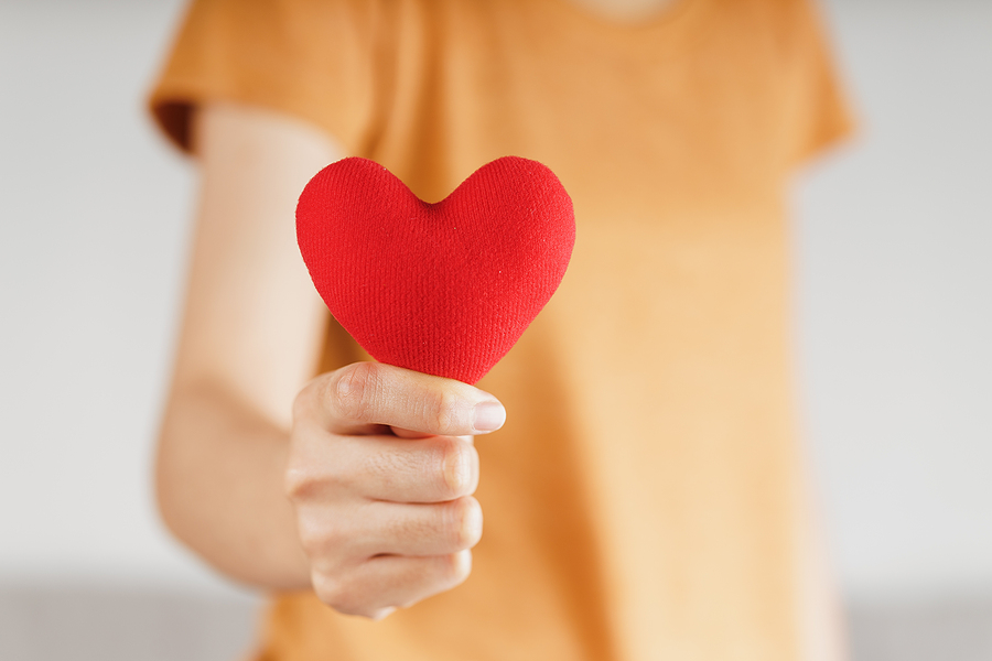 Woman holding a heart